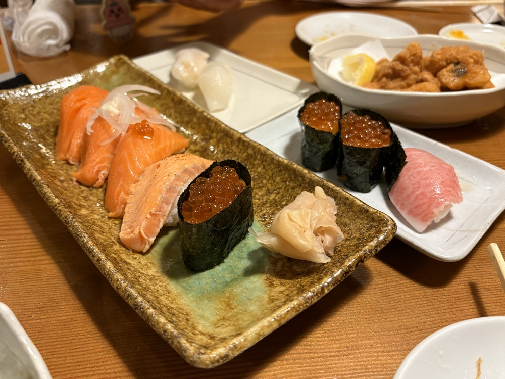 お寿司を肴に酒を飲む